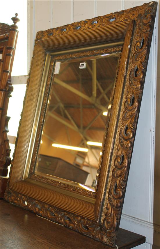 Ornate gilt framed mirror